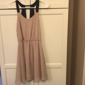 Nude and black flowy dress